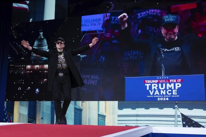 Elon Musk at the Conservative Political Action Conference, on Thursday, in Oxon Hill, Md. (AP Photo Jose Luis Magana) 250225 - Trump 2 - Musk - Cpac